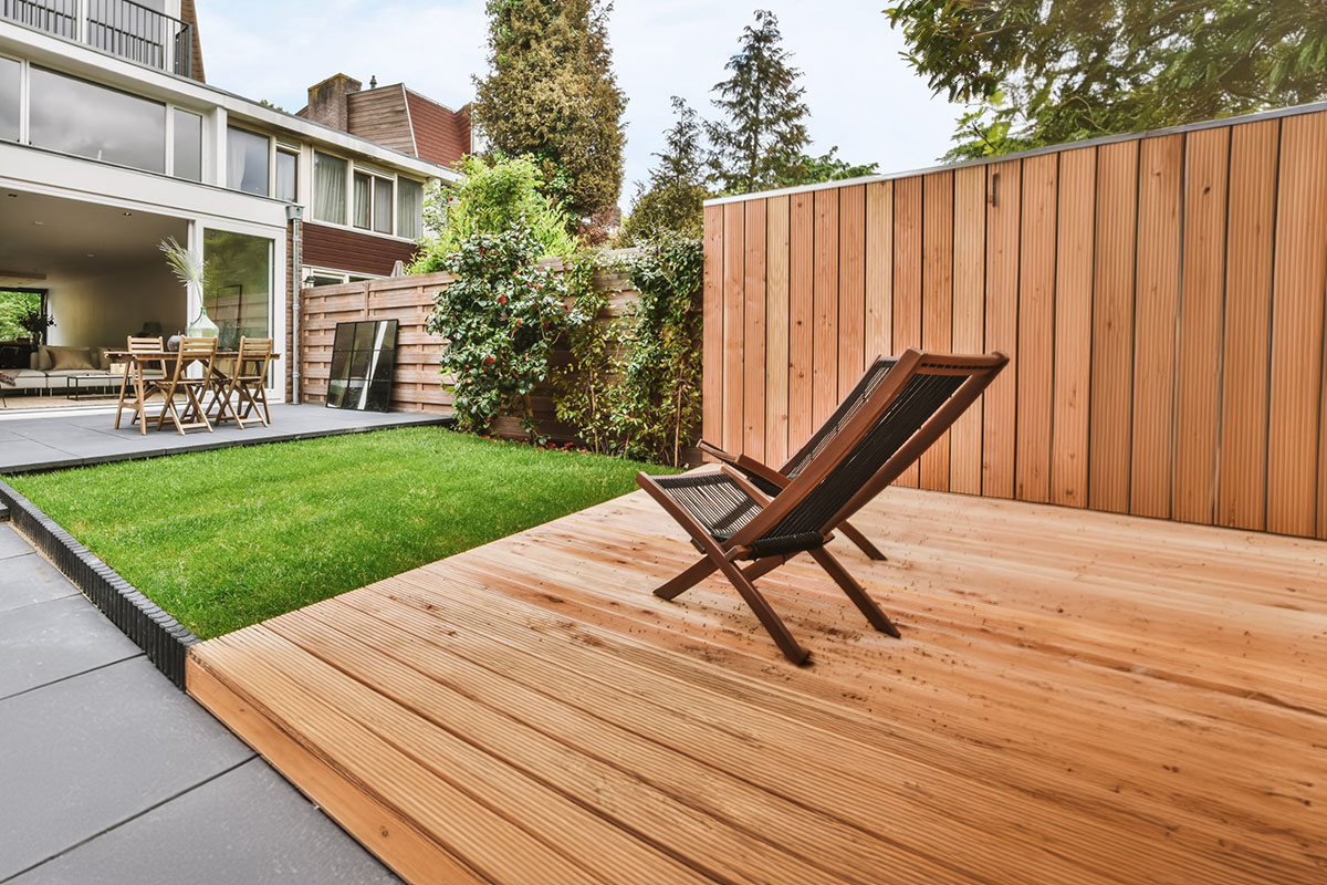 Discover the natural elegance of a beautifully crafted wood deck, expertly designed by Deck Dudes for sustainability and style